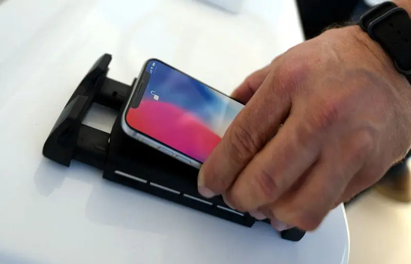 The newer Rokk Active (and Edge) models hold the phone & also center the charging coils