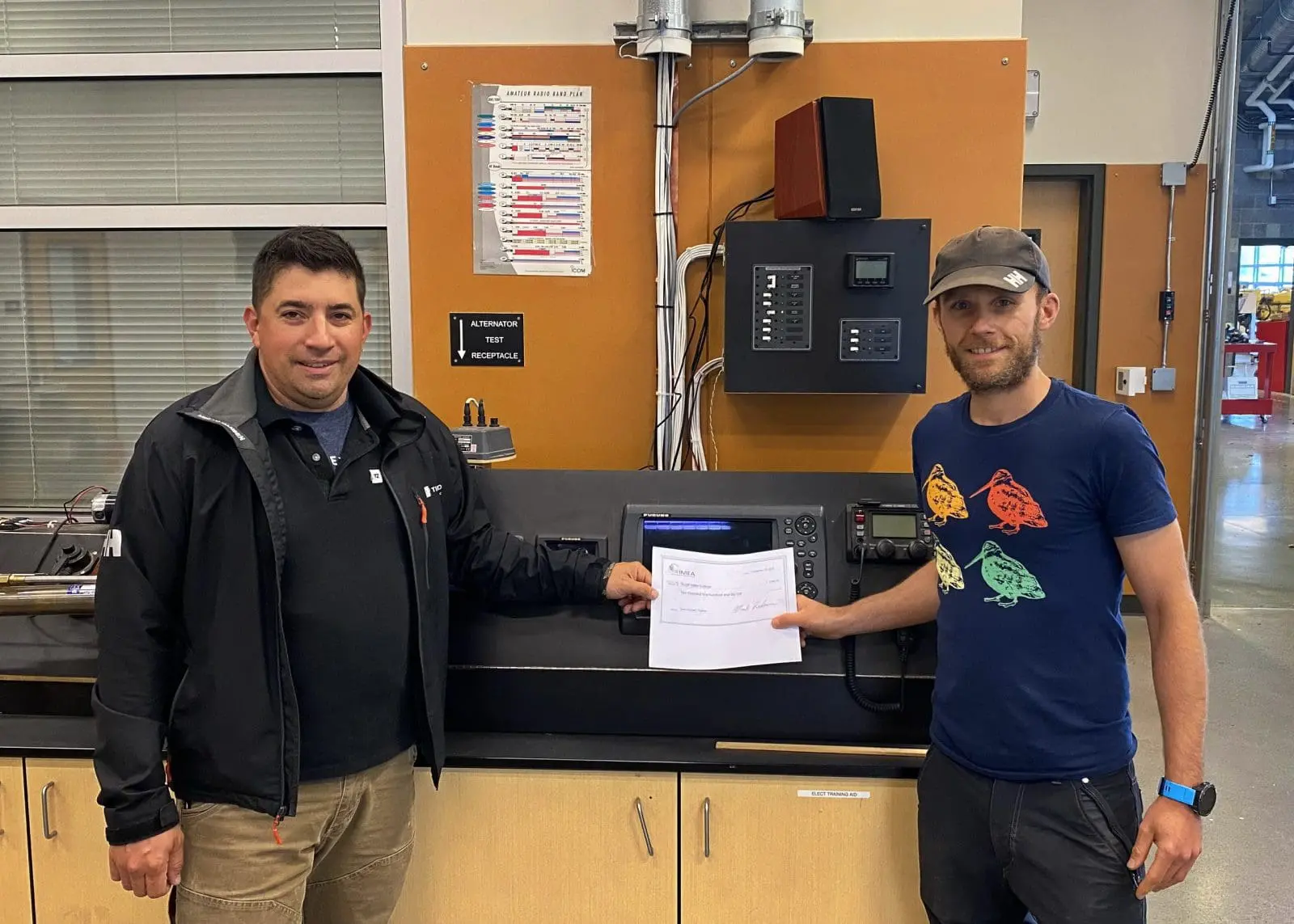 Daniel Joram, West Coast – Gulf Coast Sales Manager of Nobeltec, and scholarship recipient, Shane Eubank from Skagit Valley College in Anacortes, Washington