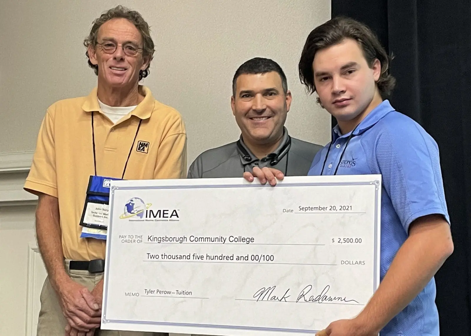 John Barry, Board Chairman of IMEA, Mark Reedenauer, President and Executive Director of IMEA and NMEA, and scholarship recipient, Tyler Perlow of Kingsborough Community College in Brooklyn, New York