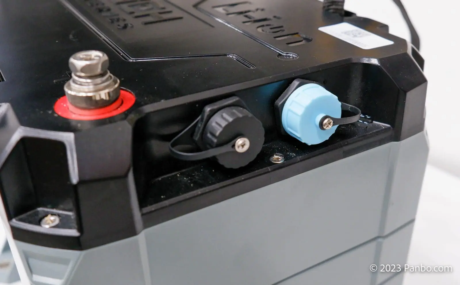 The CANBus port is located under the light blue, watertight cover